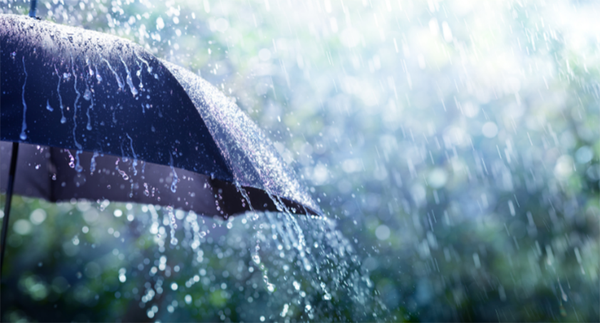 Rain falling on an umbrella