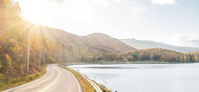 Road by mountains and water