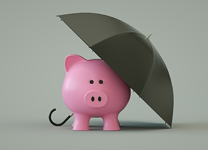 Piggy bank under an umbrella