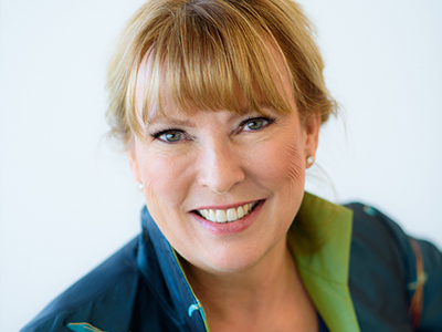 A close headshot of Susan with a soft focus background