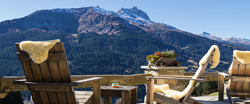 Patio chairs facing mountain image