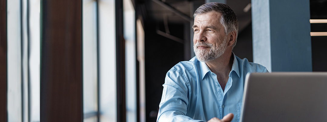 Man sitting in window